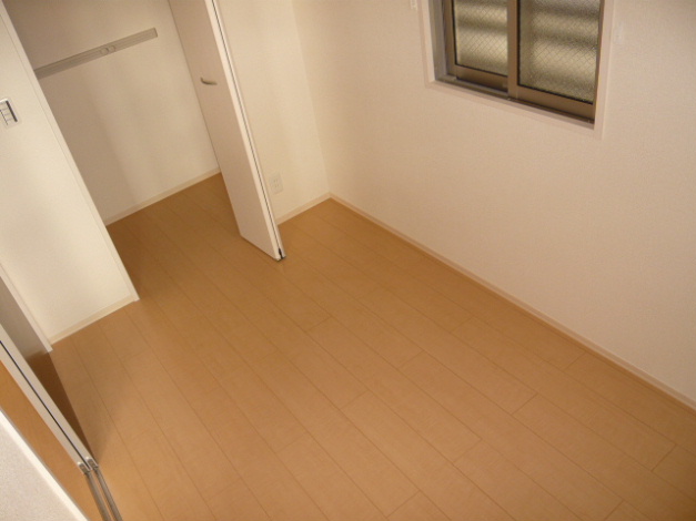 オレンジコート ベッドルーム