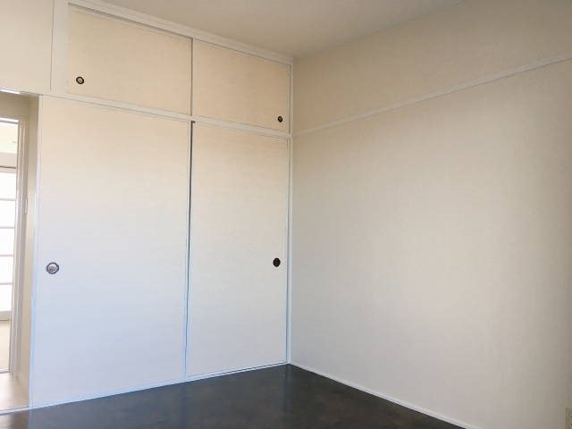 第三高木ビル ベッドルーム