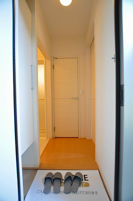 プラスラミチエ朽網 玄関