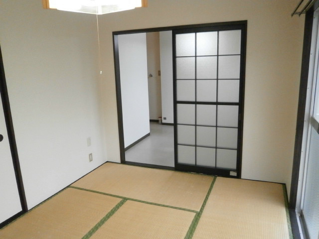 コーポさかえ ベッドルーム