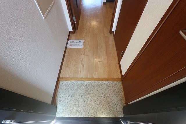 グランソレイユ　二子 玄関