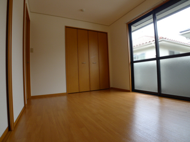 リバーサイドファミーユ ベッドルーム