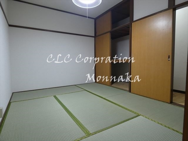 余村アパート ベッドルーム