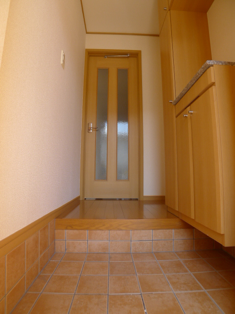 ラッフィナート　フィオーレ 玄関