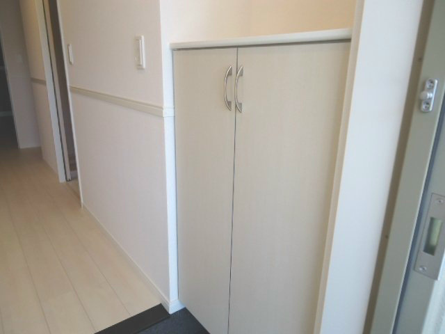 グランソレイユ 玄関