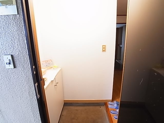 ジュネパレスコスギ 玄関