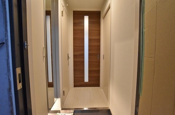 アクシオ三萩野 玄関