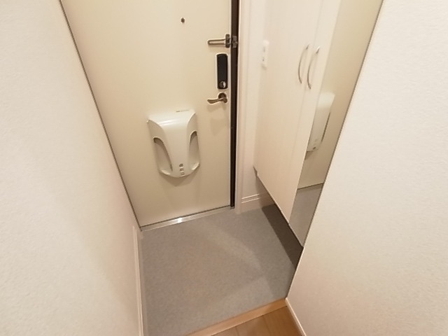 プレジールヤストシ 玄関