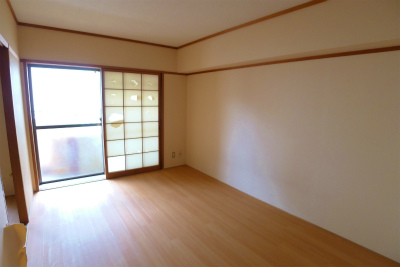 マンションつつみ ベッドルーム