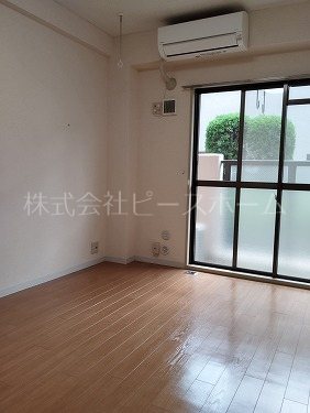 長瀬第三マンション ベッドルーム