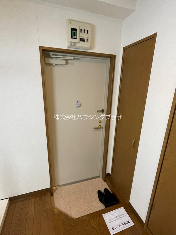プレジール狛江 玄関