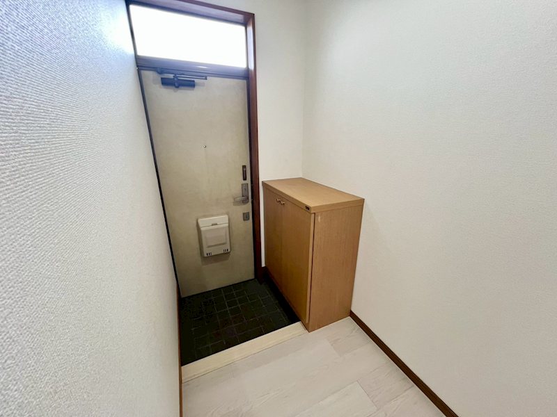 ファミール弓削 玄関