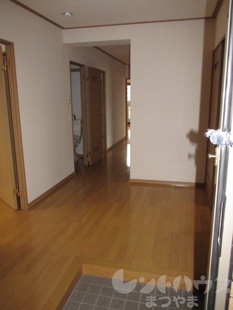 プレジール道後 玄関