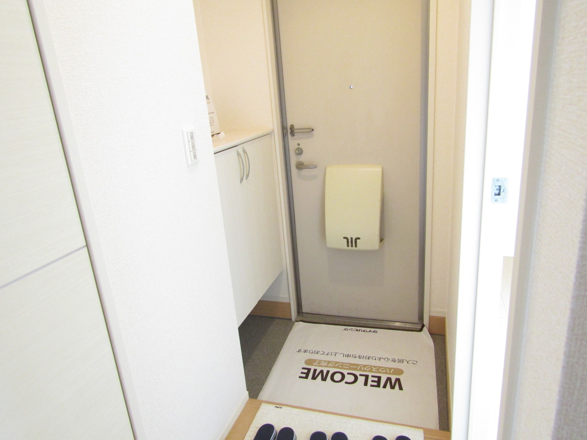 プランドールかがり 玄関