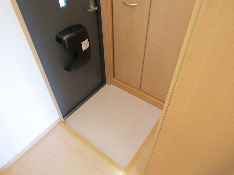 リビングタウン乙田 玄関