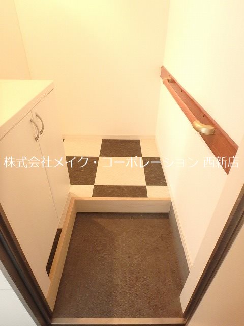 Ａレガート福大南 玄関