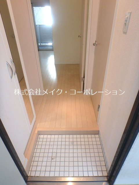 玄関 ピュアドームエストーレ姪浜 玄関