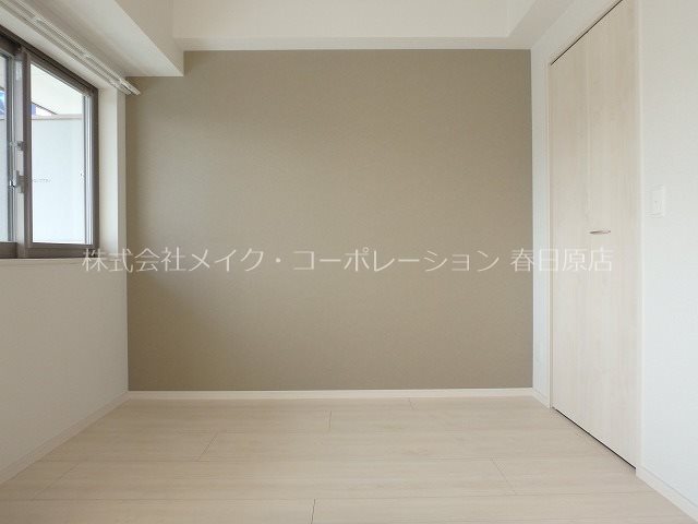 春日コンドミニアム ベッドルーム