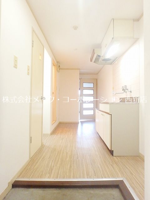 グランドシティ西新 玄関