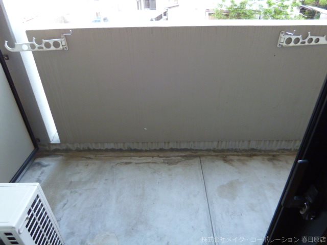 写真は同型タイプ リーセント春町 ベランダ