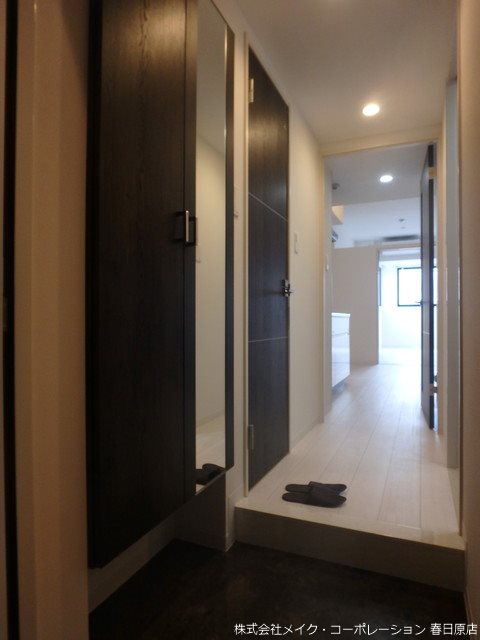 エルグランド春日 玄関