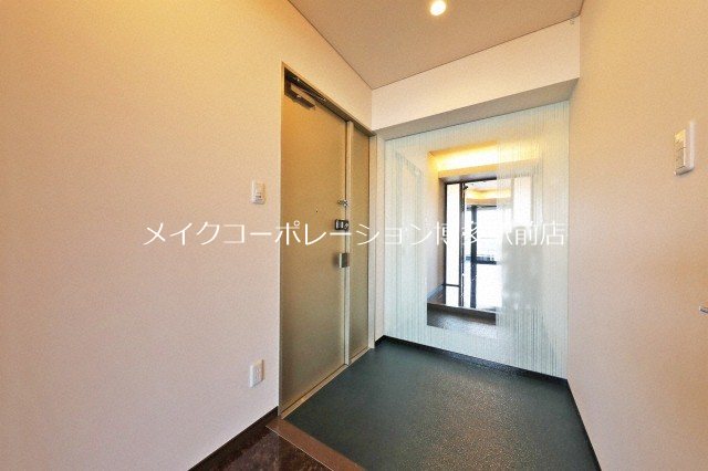 ニューガイアクレドール博多 玄関