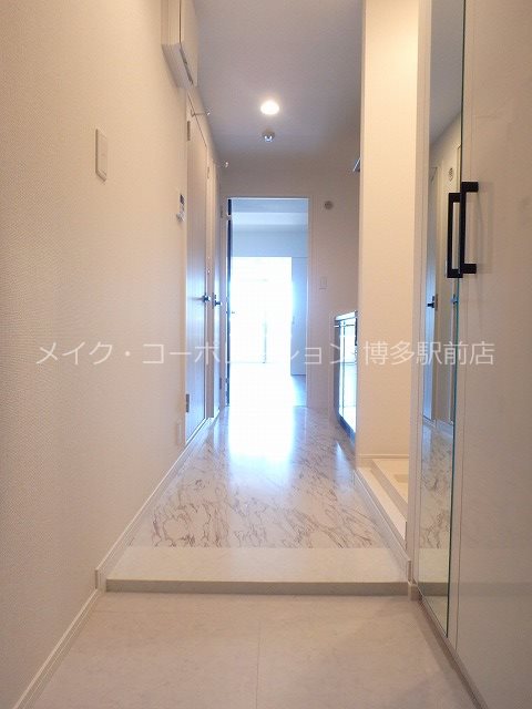 リヴィエールシャン豊 玄関