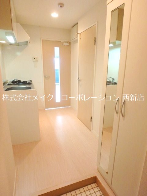 玄関 ピュアドームエストーレ姪浜 玄関