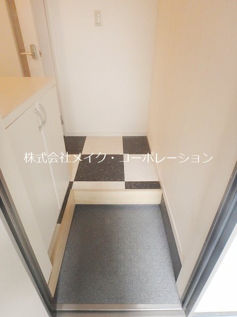 Ａレガート福大南 玄関