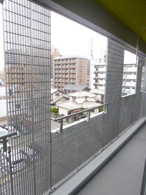 写真は同型タイプ 光第1ビル ベランダ
