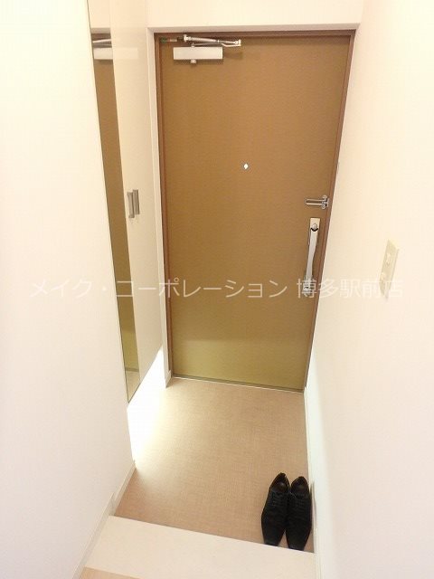 プレジールTJ 玄関