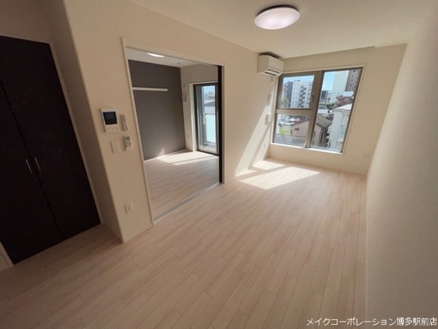 リビング メゾン・デュ・ボヌール箱崎 リビング