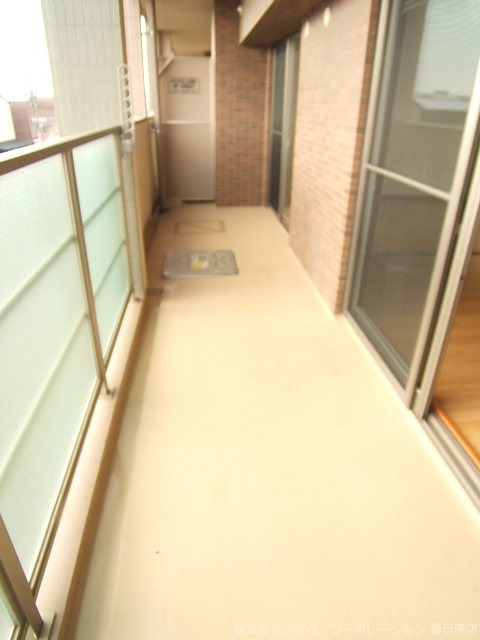 写真は同型タイプ サンライトキャッスル ベランダ