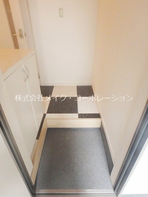 Ａレガート福大南 玄関