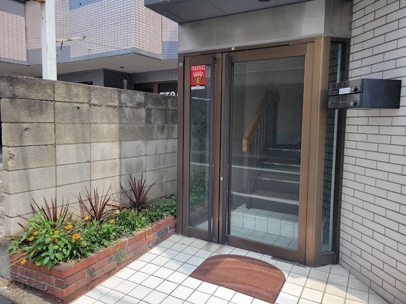 東工業ビル　2F 玄関