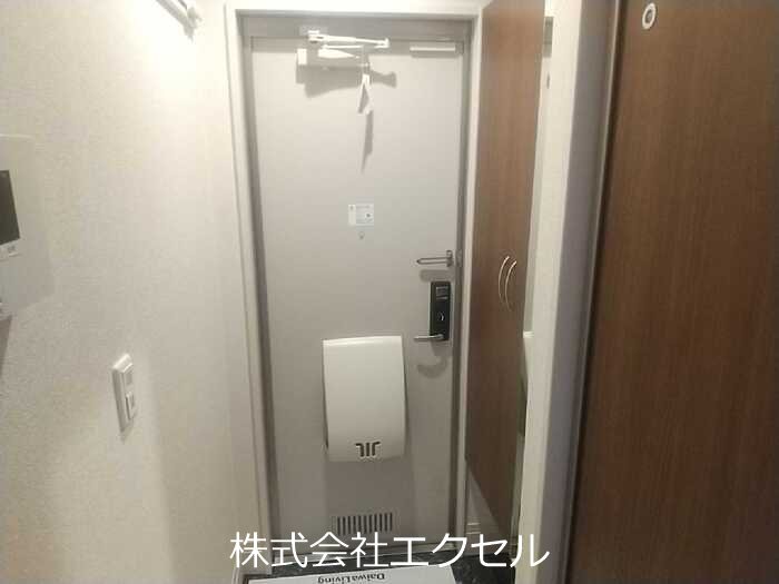 オレンジフローラ 玄関