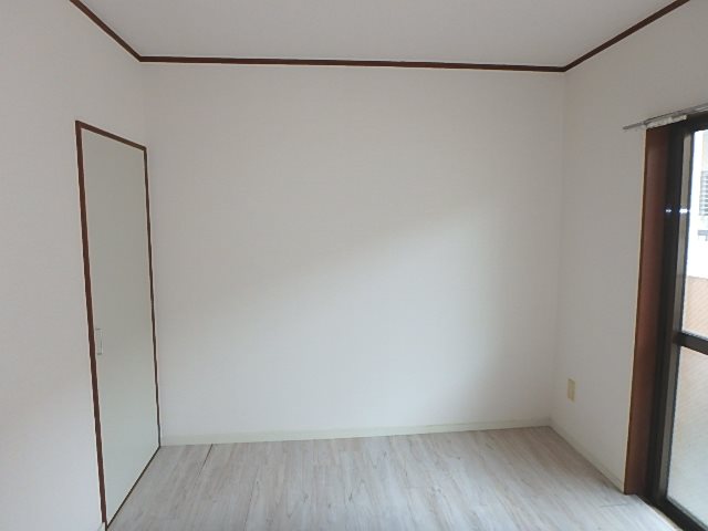 栄町コーポ ベッドルーム