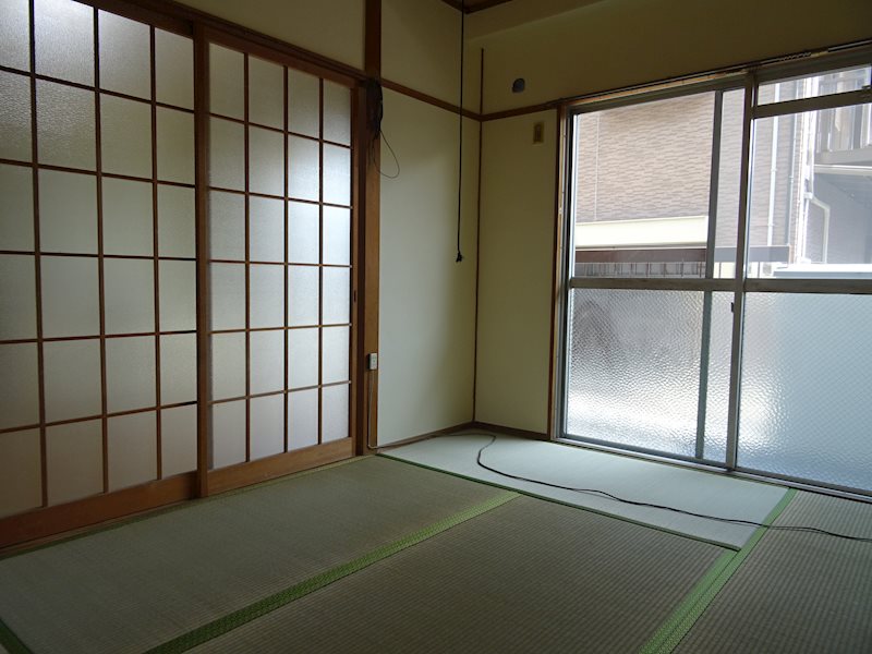 丸隆マンション ベッドルーム