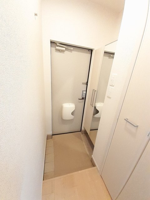 イヨマンテＣ 玄関