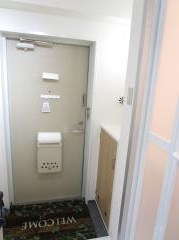 ドミールタカラ 玄関