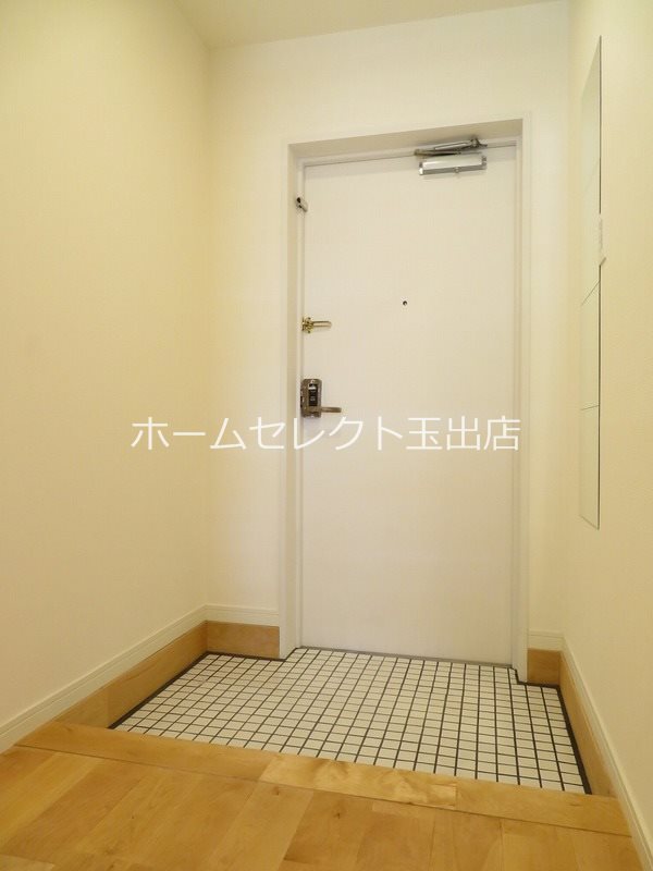 カワデンエミネンスハイツ 玄関