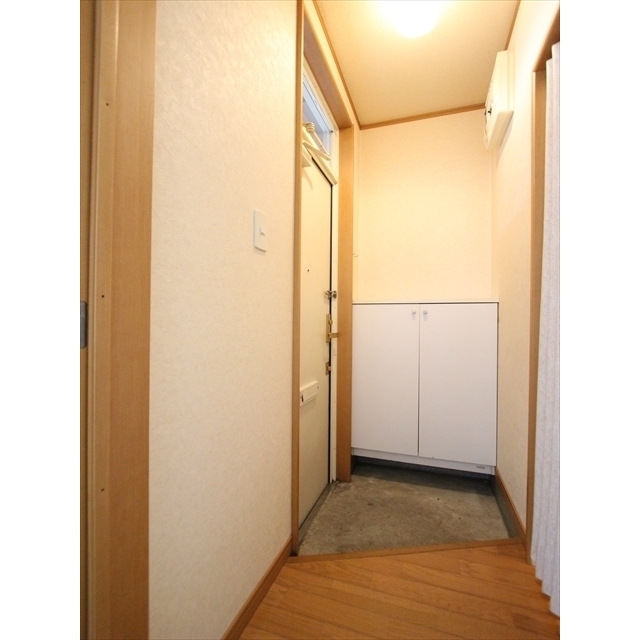プリーゼント三楽 玄関