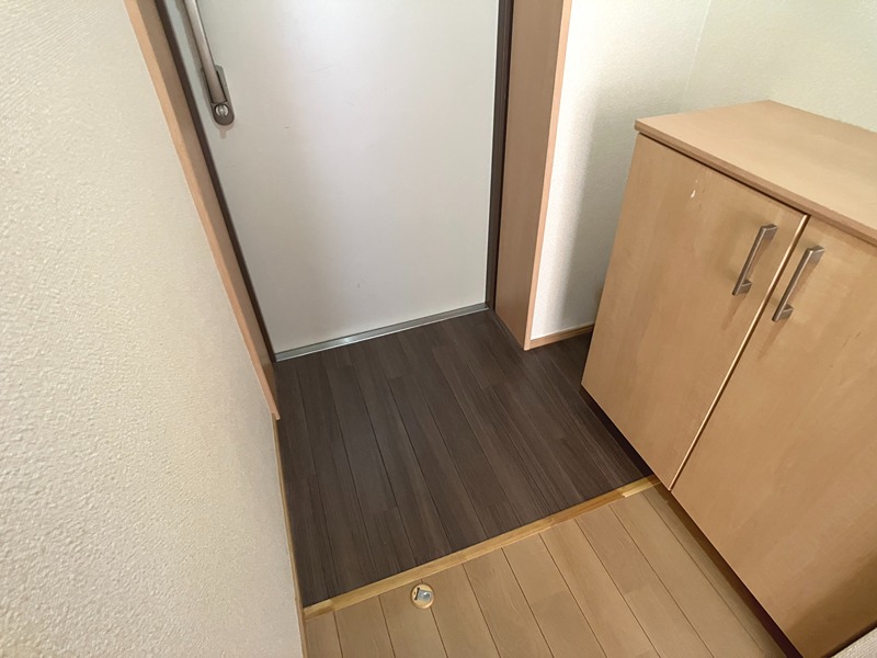 グランソレイユ屯田 玄関