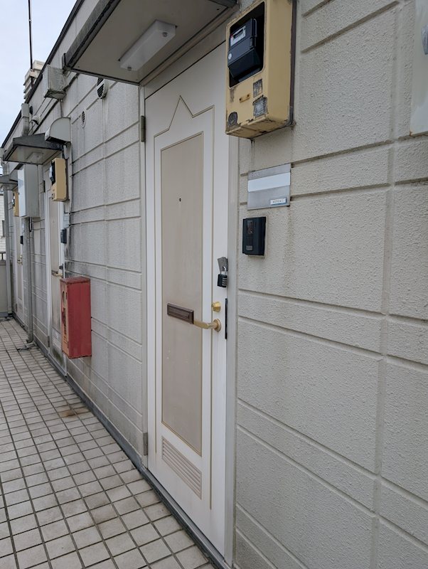 メゾンケーワイ 玄関