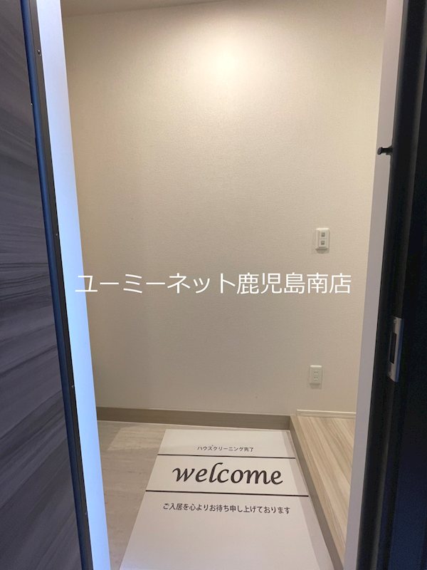 クオリティパレス千華 玄関