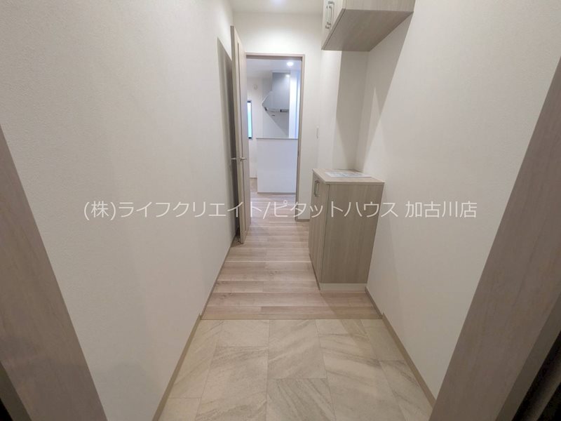 オーパス北在家 玄関