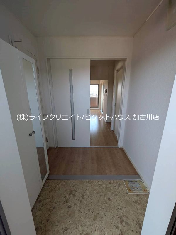 サニーヒルズシンエイ 玄関
