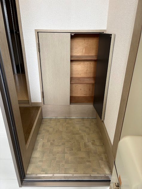 ラポールこがね 玄関