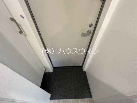 ジーメゾン草加瀬崎 玄関