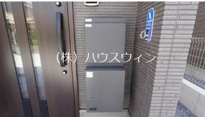 草加市金明町貸家 玄関